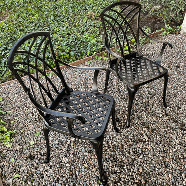 Cast iron bistro set 4 online chairs